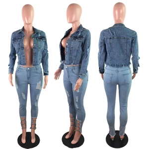 Women's blue denim set with distressed cropped jacket and lace-up ripped skinny jeans