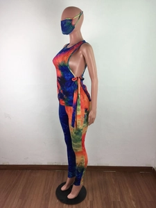 Detailed view of women's 3-piece tie-dye set with crop top, leggings and face mask