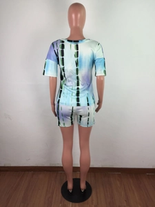 Rear view of tie-dye loungewear set featuring vertical black stripe accents on back
