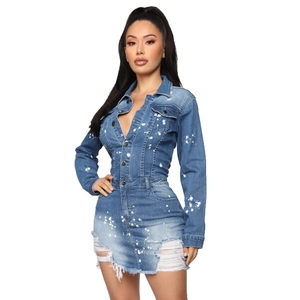 Slim fit denim dress with paint splatter, button-down front, and distressed frayed hemline