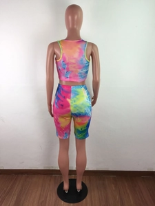 Rear view of tie-dye two-piece women's set with racerback top and high waist shorts