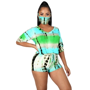 Detailed close-up of a blue and green tie-dye women's 3-piece set with matching face mask