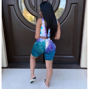 Rear view of tie-dye crop top and high-waisted shorts set with blue and purple textures