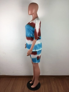 Detail of tie-dye lounge set showing the elastic fabric texture and side view on mannequin