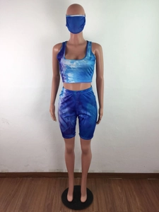 Close-up of blue and purple tie-dye 3-piece workout set with matching face mask