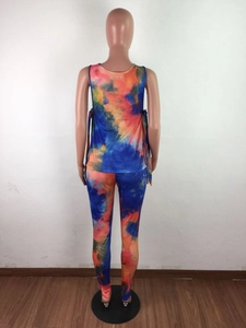 Rear view of vibrant tie-dye loungewear set featuring round neck top and slim pants