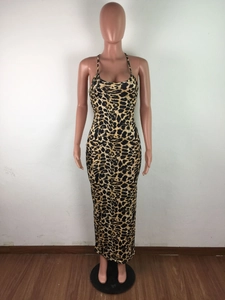 Detail view of leopard print summer maxi dress showing backless halter strap design