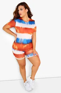 Close-up of vibrant tie-dye pattern on round neck t-shirt and elastic cycling shorts set