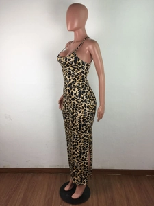 Detail view of the side slit and leopard print pattern on the slim fit maxi dress