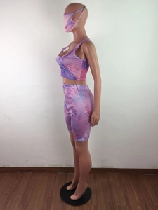 Detailed tie-dye texture on a 3-piece women's casual set with top, shorts, and mask