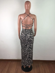 Back view of leopard print maxi dress showing backless design with crisscross tie details