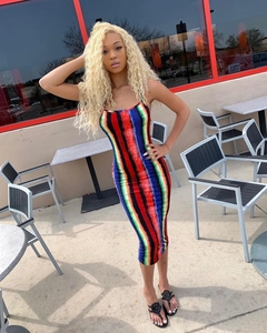 Detailed view of colorful vertical rainbow stripes on a fitted midi sundress