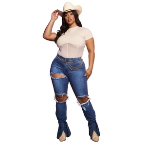 Jeans slim a vita alta con catene dorate in vita e orli a spacco alla moda donna