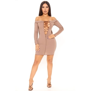 Detailed view of the ribbed knit fabric and sexy lace-up plunging neckline detail