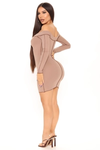 Detailed back view of a slim fit brown ribbed off-shoulder mini dress with contrast stitching