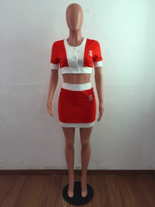 Detail view of red and white contrast two-piece crop top and bodycon skirt set