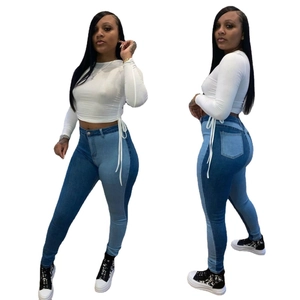 Dames crop top met trekkoord en tweekleurige patchwork skinny jeans set