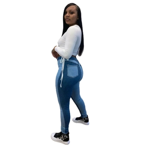 Blauwe skinny jeans voor dames met hoge stretch, kleurvlakken en witte veters aan de zijkant