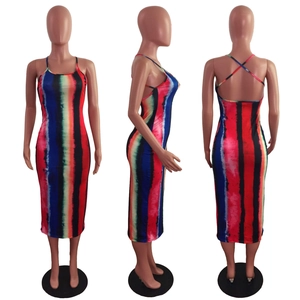 Detail of colorful rainbow striped bodycon dress featuring crisscross back strap design