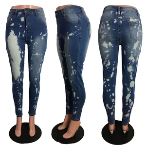 Detailansichten der High-Waist Skinny Jeans mit einzigartigen weißen Bleichspritzer-Effekten