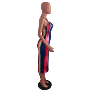 Detail of slim-fit vertical rainbow tie-dye striped long dress with spaghetti straps
