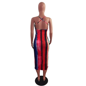 Detail of cross-back spaghetti straps on a rainbow striped bodycon maxi dress