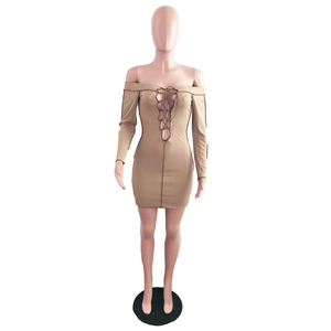 Detailed view of khaki ribbed knit off-the-shoulder mini dress with lace-up front design