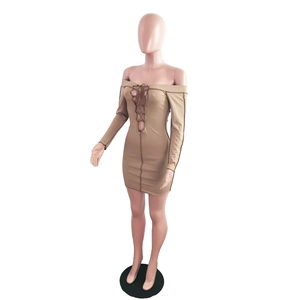 Detail of khaki lace-up neckline and contrast stitching on slim off-shoulder dress