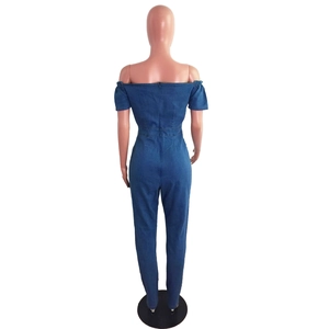 Rear view of off-shoulder blue denim jumpsuit with slim fit and back zipper detail