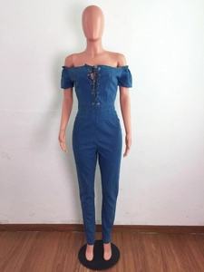 Detail of off-shoulder denim jumpsuit with eyelet lace-up front in dark blue finish