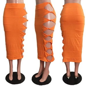 Detailed views of high-waist orange skirt with side cut-outs and knot texture