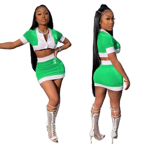 Women's two-piece crop top and mini skirt set with green and white color block design
