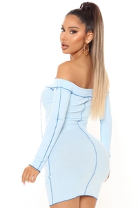 Detail of light blue ribbed off-shoulder mini dress with contrast navy blue stitching