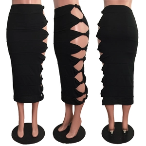 Detail of high waist black midi skirt showing side cutout with decorative bow knots