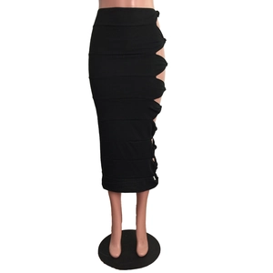 Detail view of black side cut-out knots and gathered pleats on this slimming midi skirt