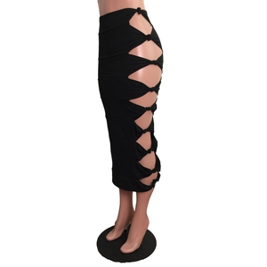 Close-up of side cutout details and decorative knots on black bodycon maxi skirt