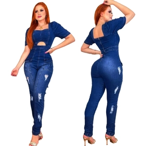Slim fit dark blue denim jumpsuit with square neck, cut-outs and distressed ripped details