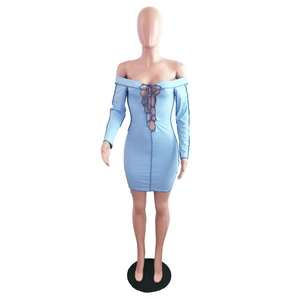 Detail of light blue off-shoulder ribbed dress with criss-cross tie neck and contrast seams