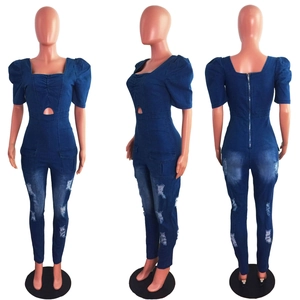 Slim fit denim jumpsuit with puff sleeves cutout waist and distressed details