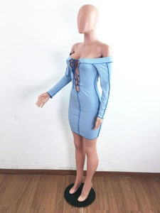Detail of light blue bodycon dress featuring ribbed fabric and front lace-up drawstring