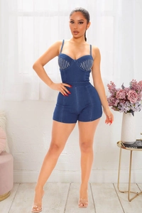 Detailed view of dark blue denim romper with silver rhinestones and thin shoulder straps