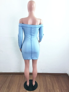 Detail of light blue ribbed mini dress showing back view and contrast stitching