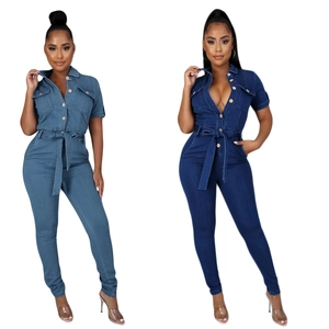 Detailed view of short-sleeve denim jumpsuits in light and dark blue with waist ties