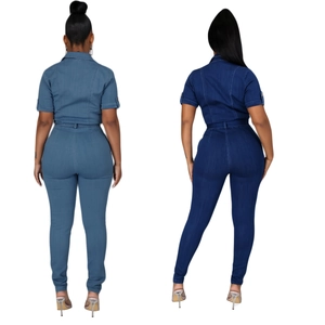 Back view of slim fit denim jumpsuit with short sleeves and waist stitching details