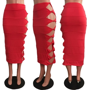 Detail view showing cut-out knotting design on the side of a red bodycon midi skirt