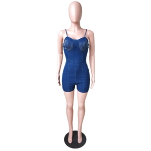 Close-up of slim fit denim romper with thin straps and sparkling rhinestone details