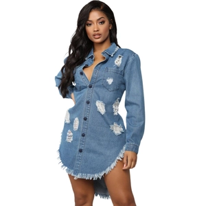 Distressed blue wash denim shirt dress with ripped fringe hem and long sleeves