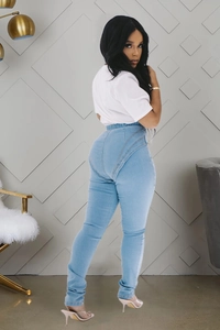 Close-up of high waist stretch denim jeans with push-up stitching for women