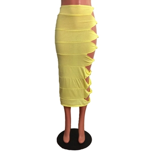 Detailed side view of yellow bodycon skirt featuring stylish cut-outs and knot details