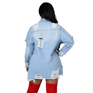 Oversized light blue distressed denim jacket featuring ripped back and frayed edges